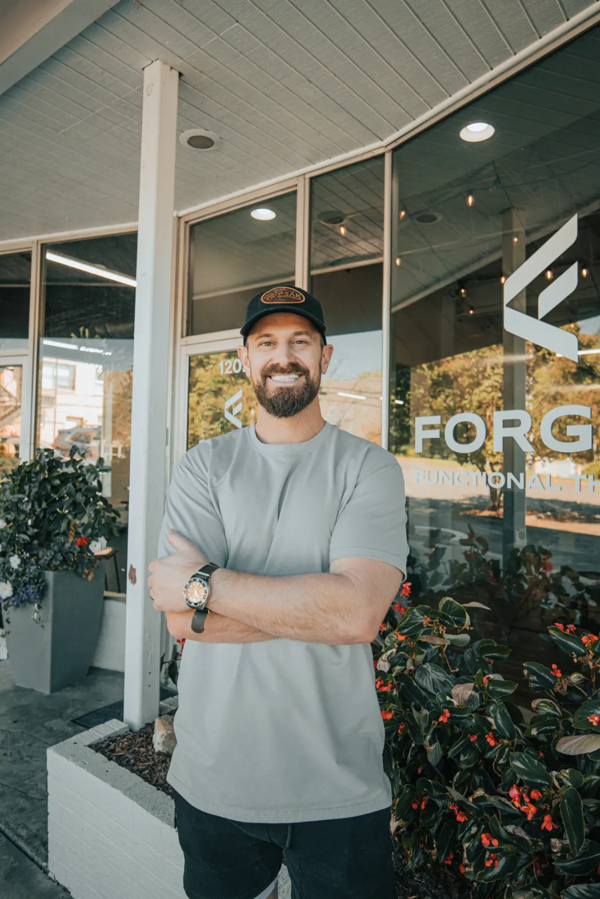 Dr. Jacob Treadway, Doctor of Physical Therapy, smiling at Forged Functional Therapy in Knoxville.