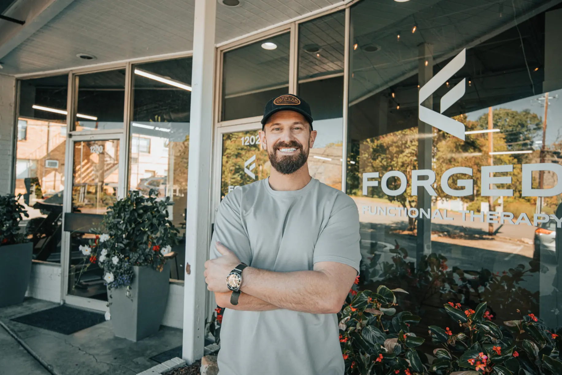 Dr. Jacob Treadway, Doctor of Physical Therapy, smiling at Forged Functional Therapy in Knoxville.