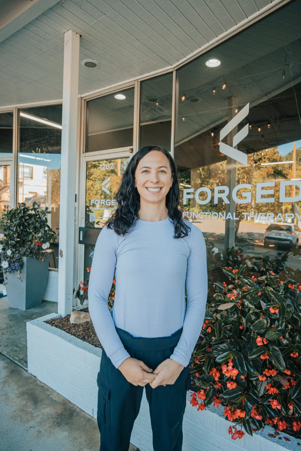 Pelvic floor specialist Mariah Lohr smiling confidently at Forged Functional Therapy in Knoxville, TN.